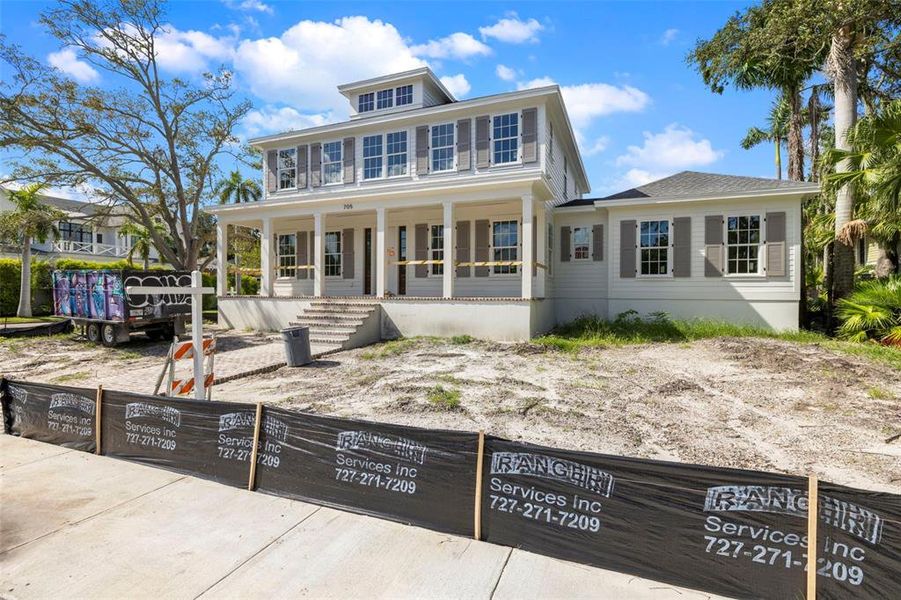Front exterior of a new home in , St. Petersburg, FL, highlighting curb appeal (Image 32).