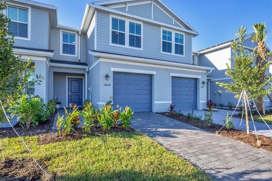 Front exterior of a new home in , Bradenton, FL, highlighting curb appeal (Image 1). Front exterior of a new home in , Bradenton, FL, highlighting curb appeal (Image 1).