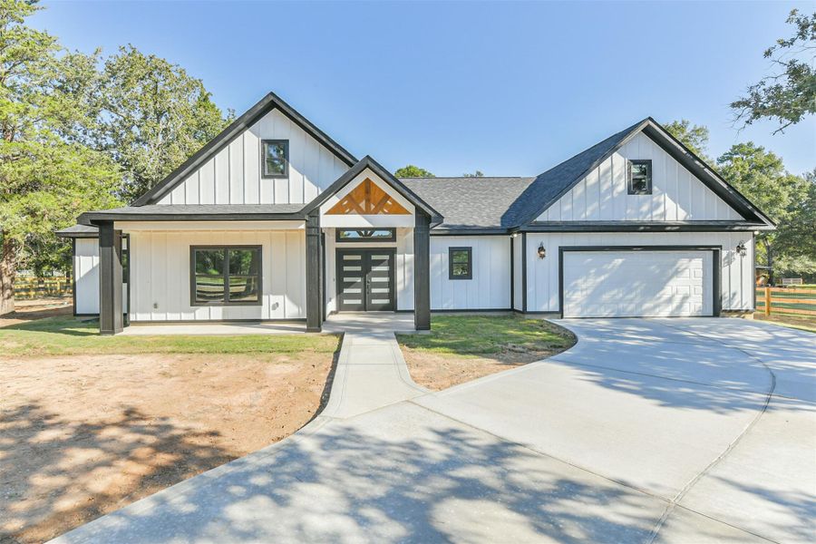 Front exterior of a new home in , Hockley, TX, highlighting curb appeal (Image 25).