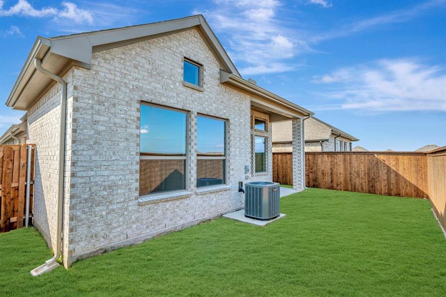 Exterior details and patio area of a home in Creekshaw – Gardens, Royse City (Image 3). Exterior details and patio area of a home in Creekshaw – Gardens, Royse City (Image 3).