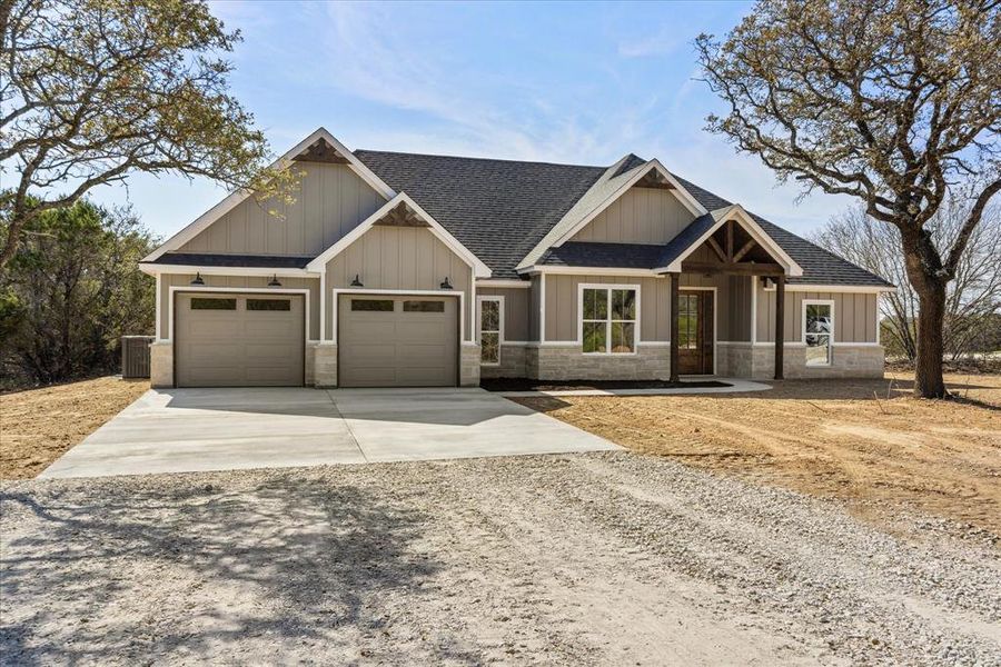 Front exterior of a new home in , Bluff Dale, TX, highlighting curb appeal (Image 24).