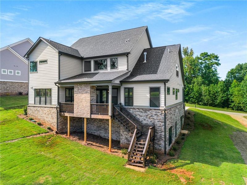 Front exterior of a new home in , Jefferson, GA, highlighting curb appeal (Image 27).