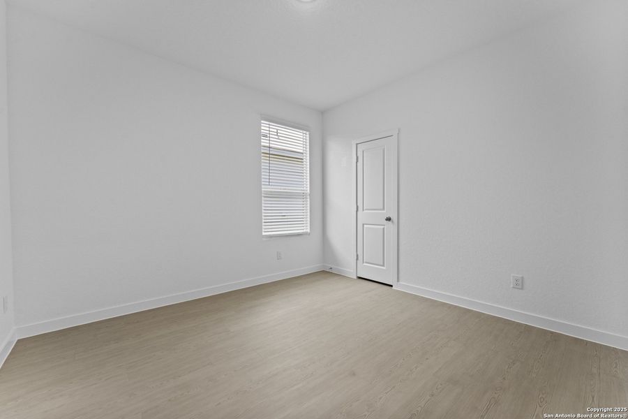 Spacious, unfurnished interior of a new home in Waterwheel: Coastline Collection, San Antonio (Image 15).