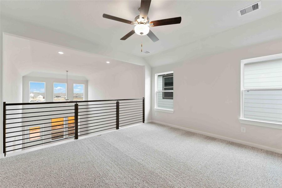 Upstairs, a generous gameroom provides extra space for fun and relaxation.