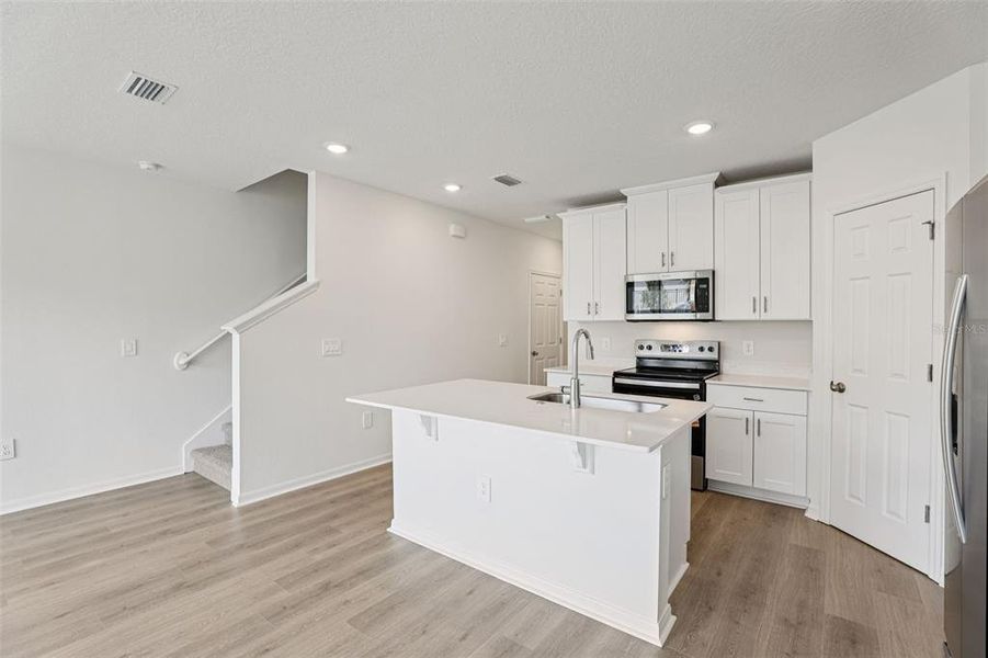 Furnished interior view inside a new home in Cagan Crossings West, Clermont (Image 10).