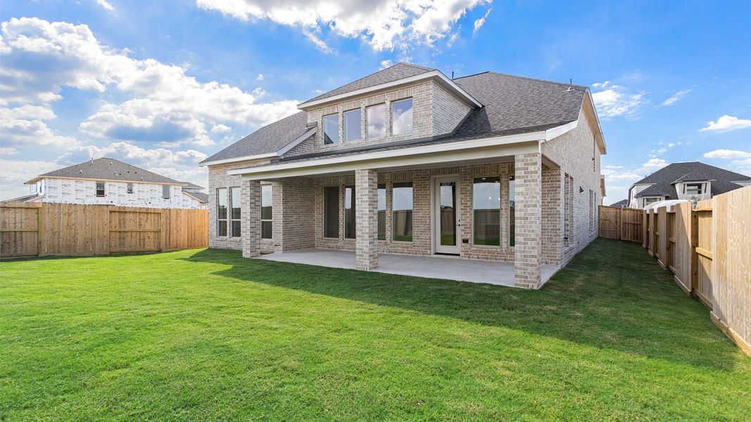 Exterior details and patio area of a home in Cross Creek West, Fulshear (Image 2).