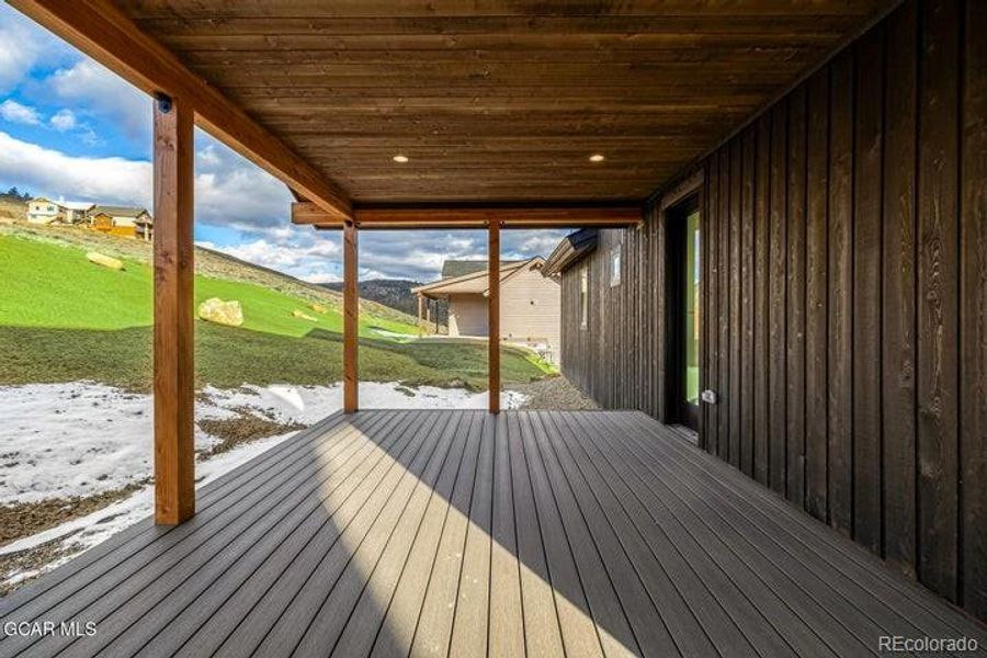 Exterior details and patio area of a home in , Granby (Image 3).