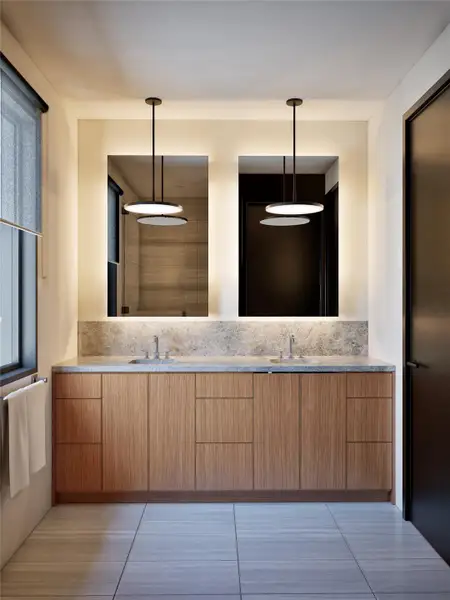 Bathroom with double vanity, backsplash, and light tile patterned floors Bathroom with double vanity, backsplash, and light tile patterned floors