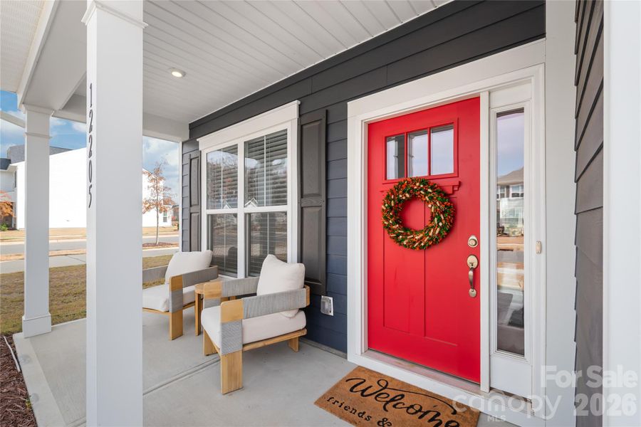 This beautiful entry draws your attention. Enjoy a cup of coffee while relaxing on your covered front porch
