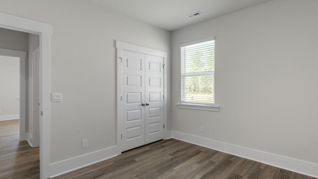 Spacious, unfurnished interior of a new home in The Haven at Indigo Preserve, Leland (Image 27).