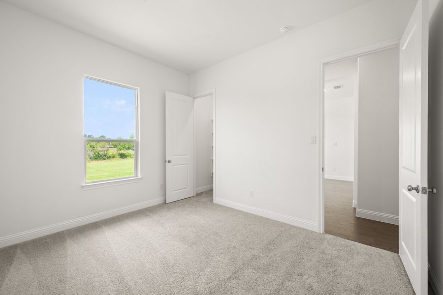 Spacious, unfurnished interior of a new home in Mockingbird Hills - Premiere Series, Joshua (Image 25).