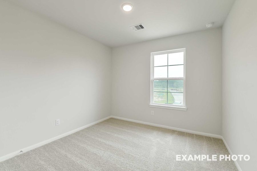 Spacious, unfurnished interior of a new home in Caney Creek Place, Conroe (Image 26).