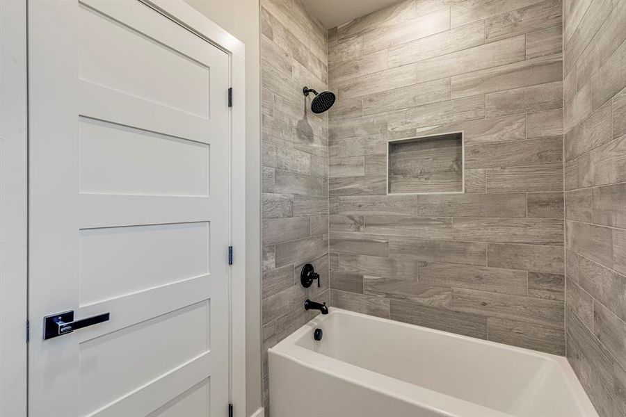 Bathroom featuring shower / bathing tub combination