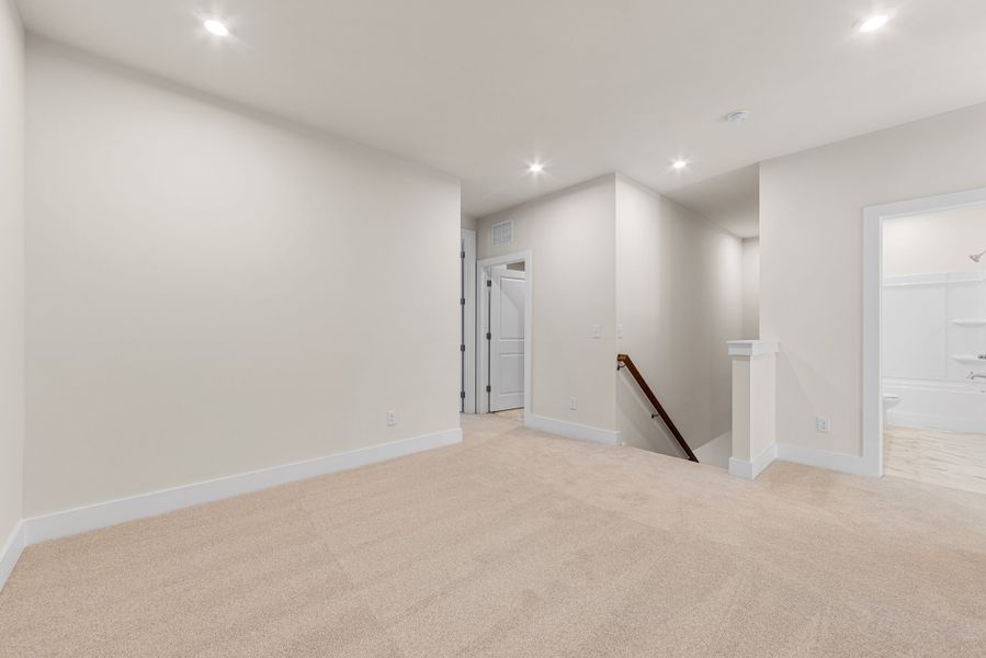 Spacious, unfurnished interior of a new home in Seven Oaks, Belmont (Image 28).
