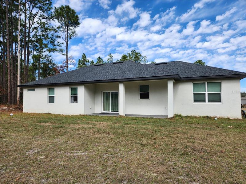 Exterior details and patio area of a home in , Ocala (Image 46).