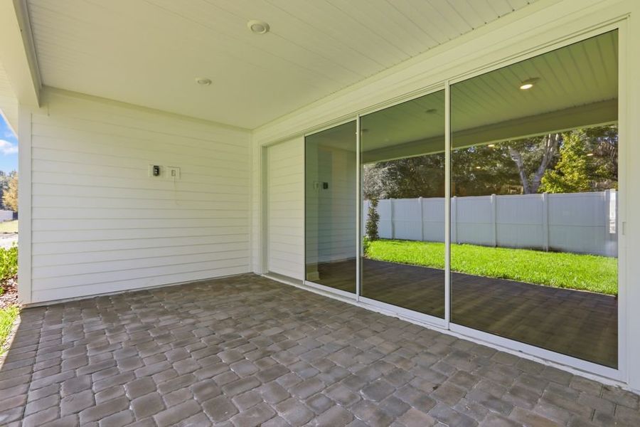 Exterior details and patio area of a home in Headwaters at Lofton Creek, Yulee (Image 3).