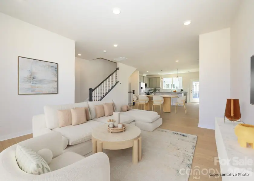 Furnished interior view inside a new home in Central Living at Craig, Charlotte (Image 3).