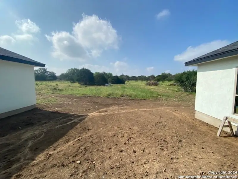 Exterior details and patio area of a home in , Bandera (Image 3).