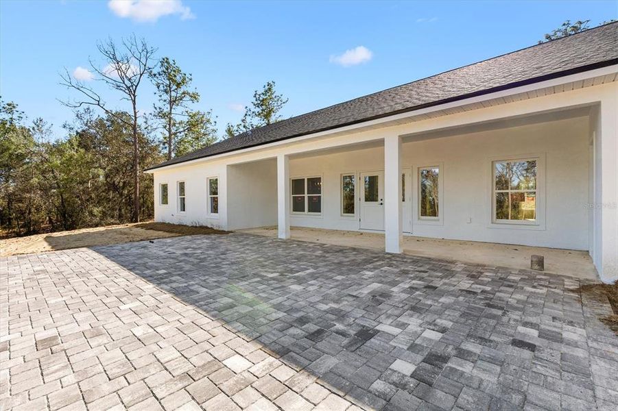 Exterior details and patio area of a home in , Wildwood (Image 3).