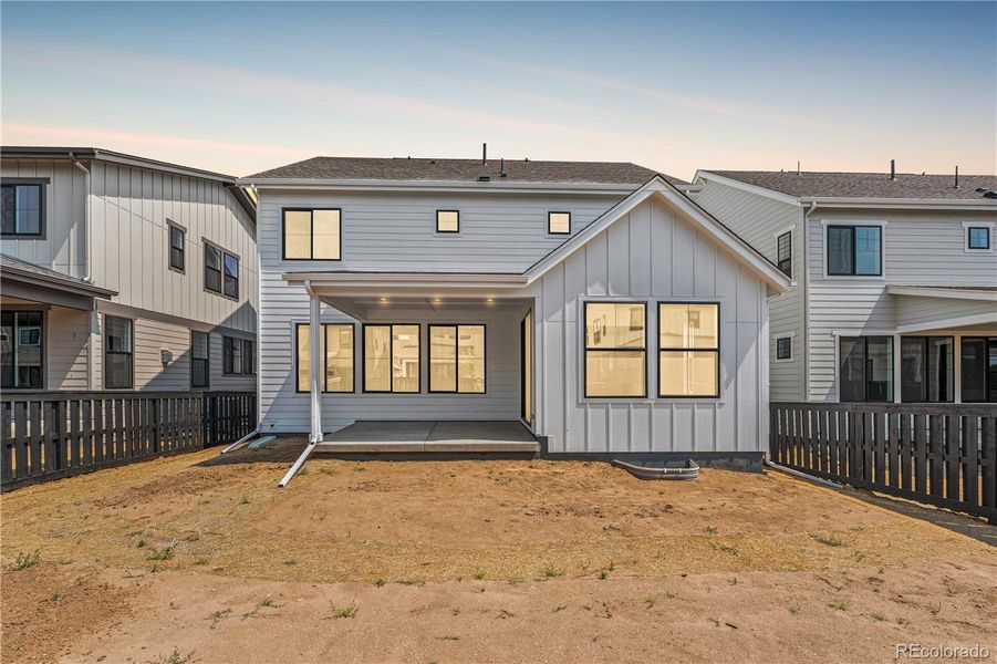 Exterior details and patio area of a home in Harmony at Solstice, Littleton (Image 2).
