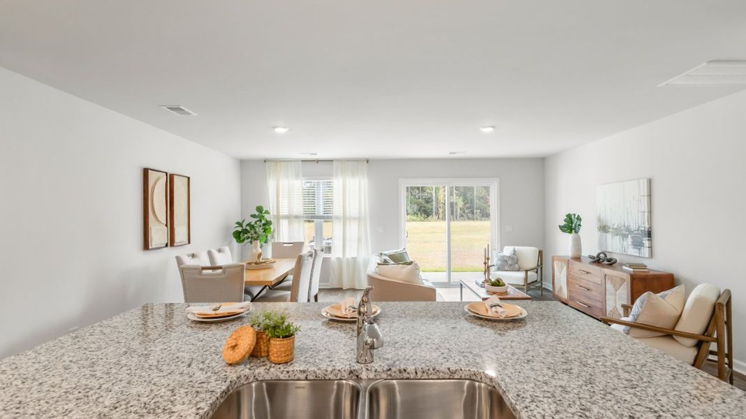Furnished interior view inside a new home in The Towns at Blue Jay, Rincon (Image 6).