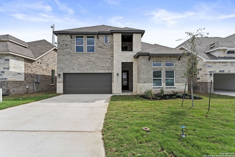 Front exterior of a new home in , New Braunfels, TX, highlighting curb appeal (Image 1).