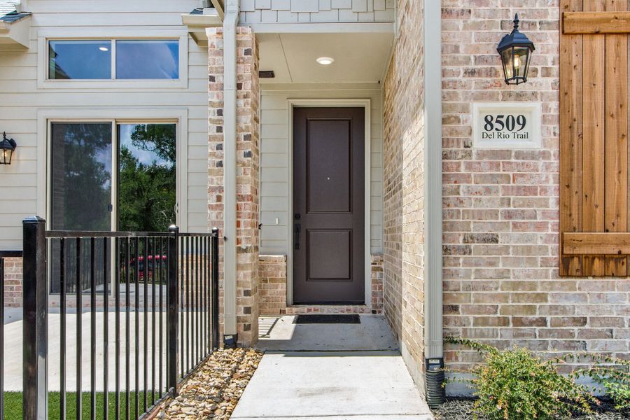 Exterior details and patio area of a home in Cottonwood Creek, Rowlett (Image 3).
