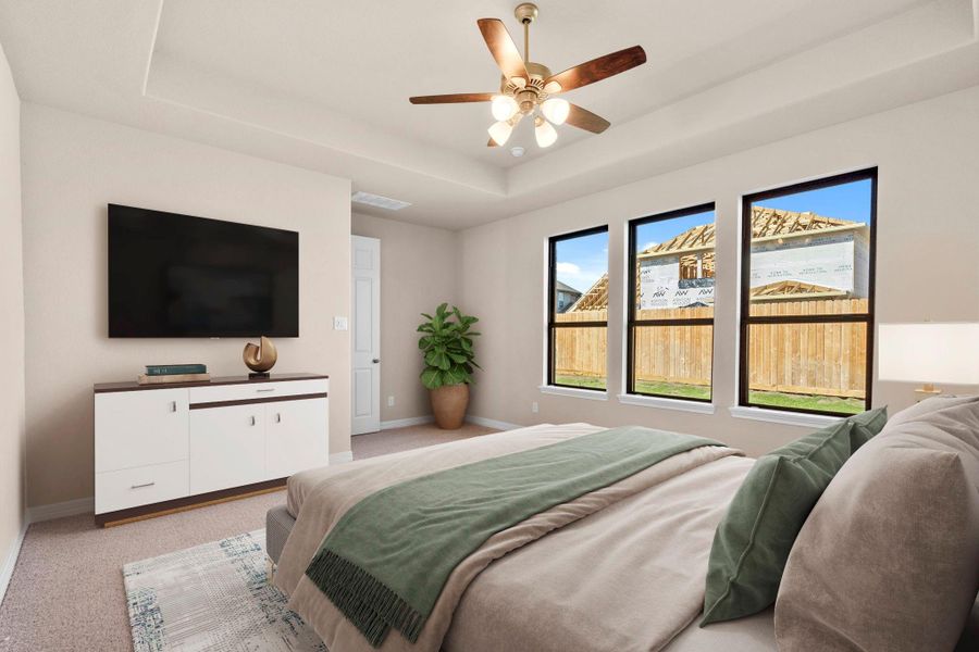The primary bedroom is generously sized, creating a tranquil and spacious retreat that offers ample room for relaxation. Featuring plush carpet, high ceilings, fresh paint, and large windows that lets in natural lighting throughout the day. The primary bedroom is generously sized, creating a tranquil and spacious retreat that offers ample room for relaxation. Featuring plush carpet, high ceilings, fresh paint, and large windows that lets in natural lighting throughout the day.