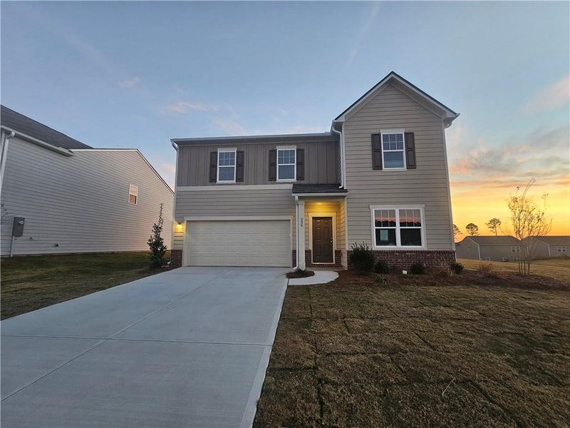Front exterior of a new home in Casteel, Bethlehem, GA, highlighting curb appeal (Image 1). Front exterior of a new home in Casteel, Bethlehem, GA, highlighting curb appeal (Image 1).