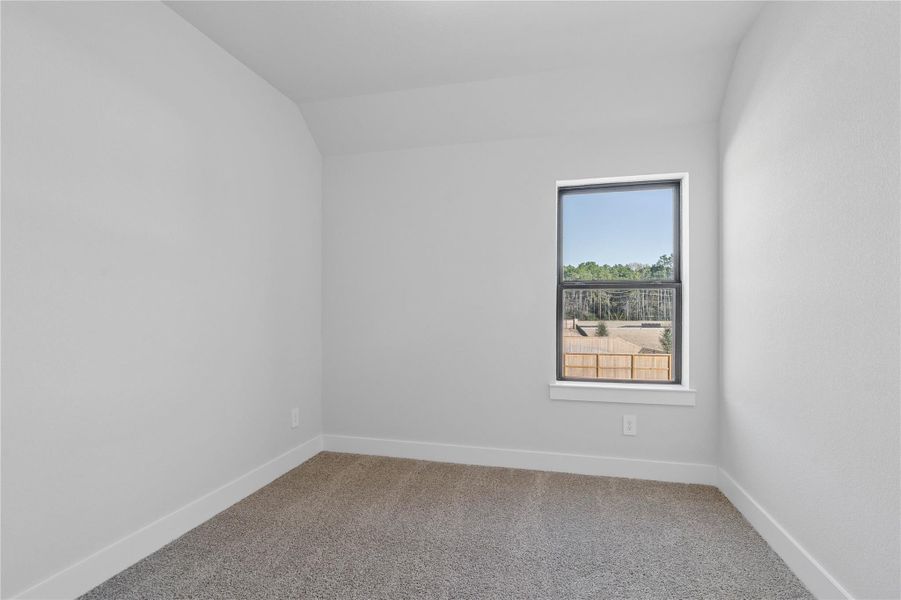 Step into this bright and airy room, offering a tranquil space to unwind. The large window illuminate the room's sloped ceiling and neutral tones, creating a cheerful and airy environment. Step into this bright and airy room, offering a tranquil space to unwind. The large window illuminate the room's sloped ceiling and neutral tones, creating a cheerful and airy environment.