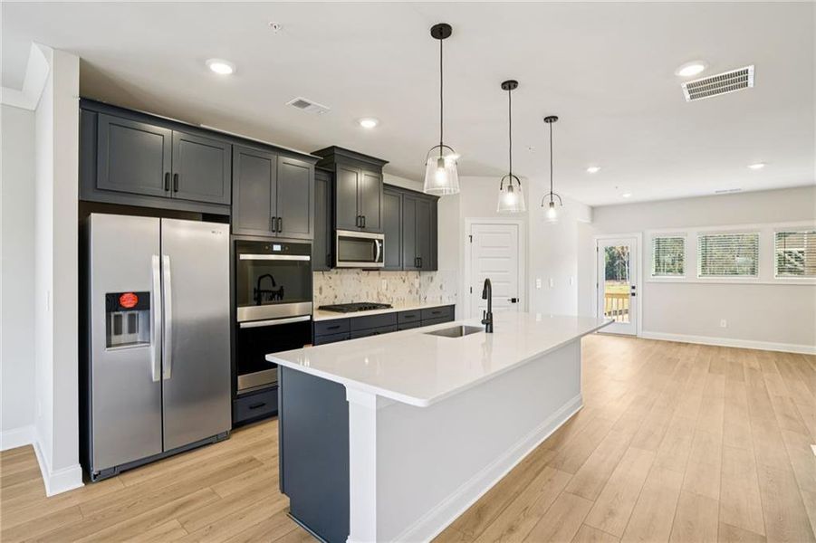 Furnished interior view inside a new home in Hemingway - Highland Series, Cumming (Image 12).