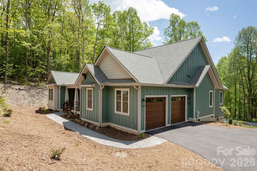 Front exterior of a new home in , Flat Rock, NC, highlighting curb appeal (Image 24).