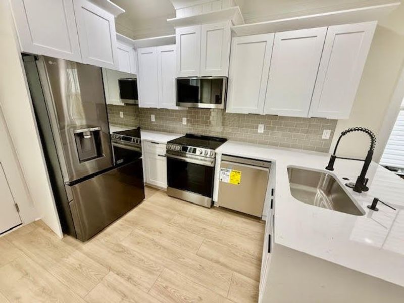 Furnished interior view inside a new home in , North Charleston (Image 10).