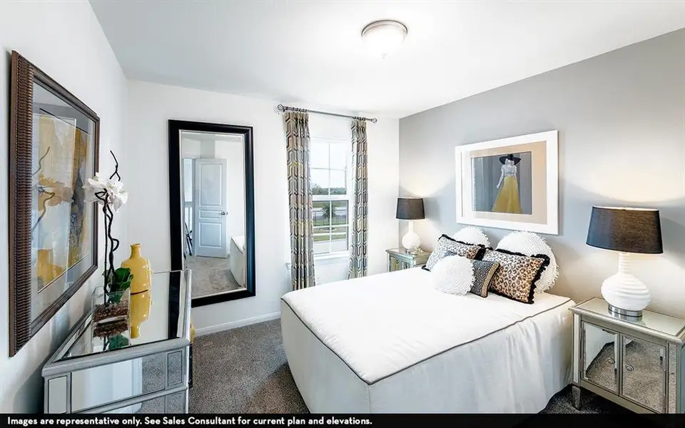 Carpeted room featuring a window with patterned drapes, a flush-mount ceiling light fixture, a full-length wall mirror, and light-toned painted walls Carpeted room featuring a window with patterned drapes, a flush-mount ceiling light fixture, a full-length wall mirror, and light-toned painted walls