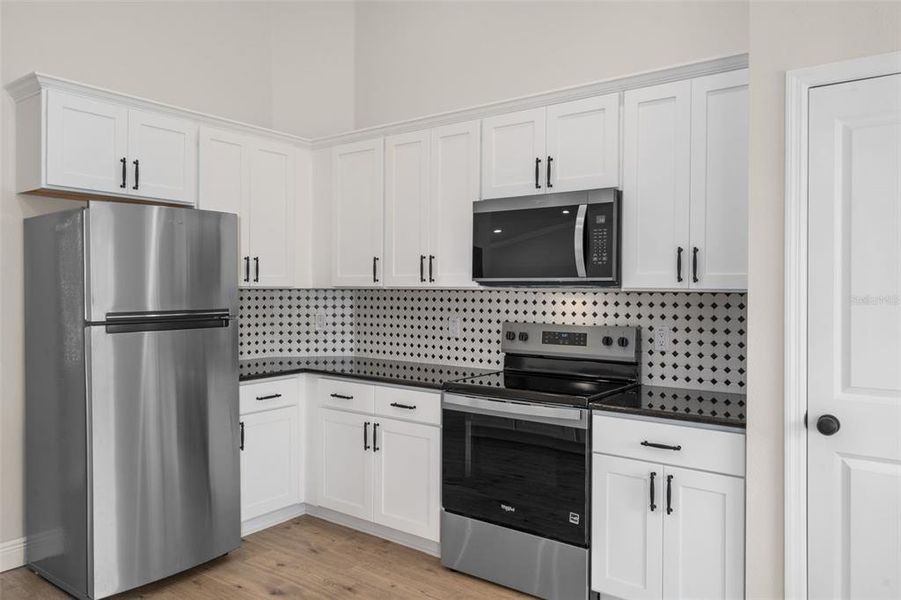 Furnished interior view inside a new home in , Weeki Wachee (Image 13).