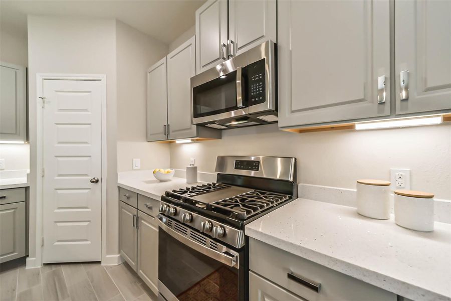 Photos are sample images from a previously built home with the same floor plan. Finishes and fixtures in the current home have been upgraded and may vary. Photos are sample images from a previously built home with the same floor plan. Finishes and fixtures in the current home have been upgraded and may vary.