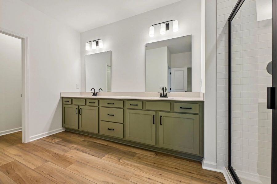Primary Bath featuring the AW Collection® Rosemary - Organic textures meet bold design. Primary Bath featuring the AW Collection® Rosemary - Organic textures meet bold design.