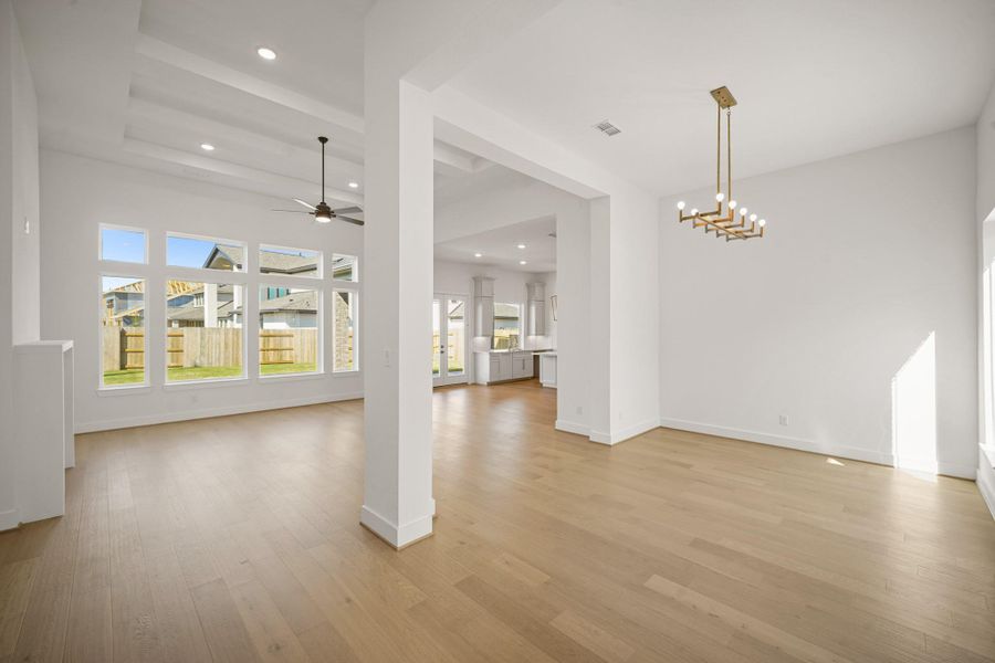 Seamless flow between the dining and living areas, creating a harmonious and open living space. Seamless flow between the dining and living areas, creating a harmonious and open living space.