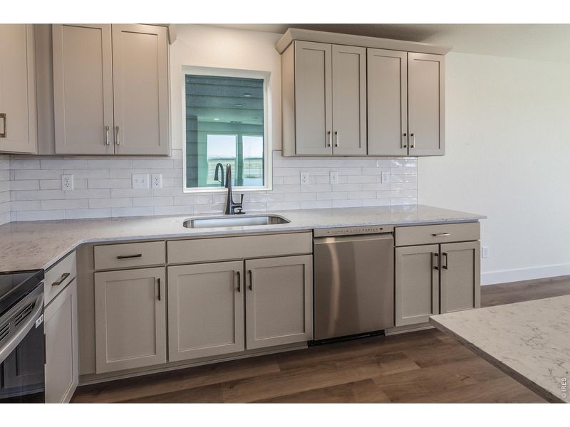 Furnished interior view inside a new home in Prairie Song Story Collection - Single Family Homes, Windsor (Image 9).