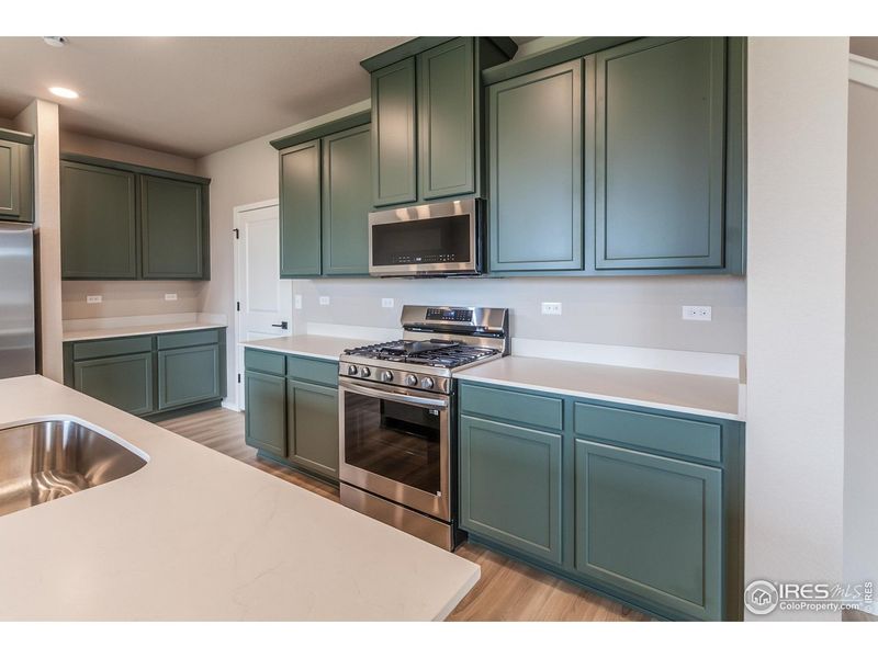 Furnished interior view inside a new home in Granary Trailblazer Collection - Single Family Homes, Johnstown (Image 8).