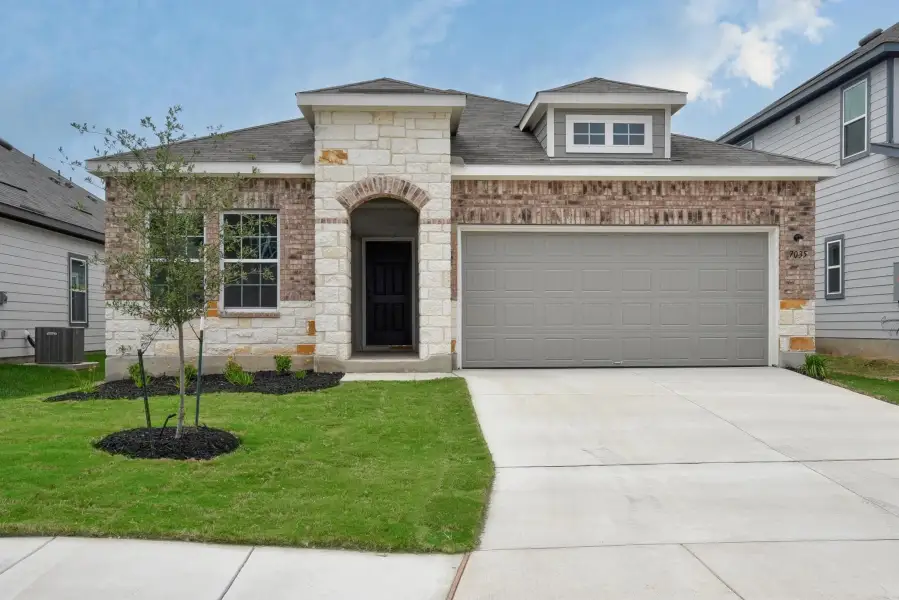 Representative exterior photo of a completed home built from the Hadley by Ashton Woods in Saddlebrook Ranch, Schertz, TX (Image 15).