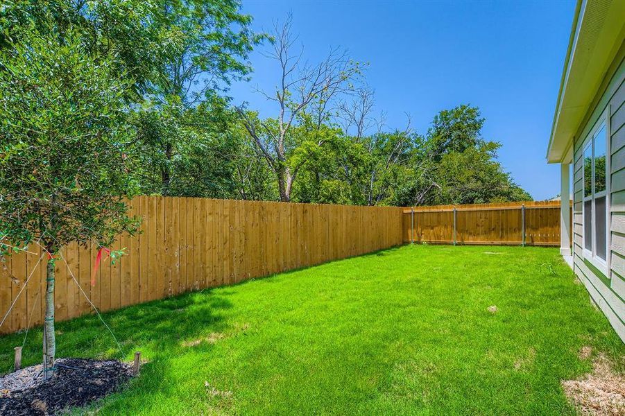 Front exterior of a new home in Sperling Farms, Ferris, TX, highlighting curb appeal (Image 17). Front exterior of a new home in Sperling Farms, Ferris, TX, highlighting curb appeal (Image 17).