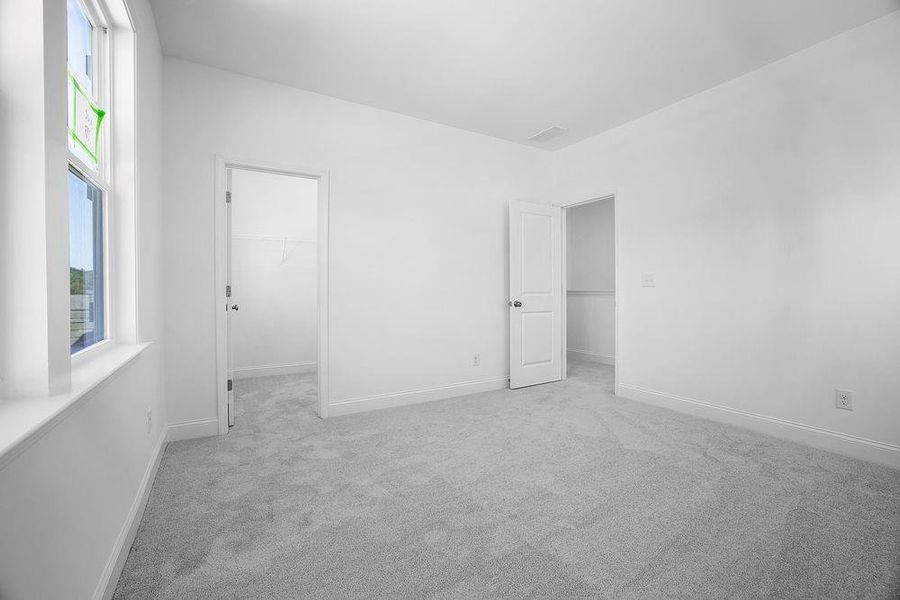 Spacious, unfurnished interior of a new home in Bailey Fence, Dacula (Image 22).