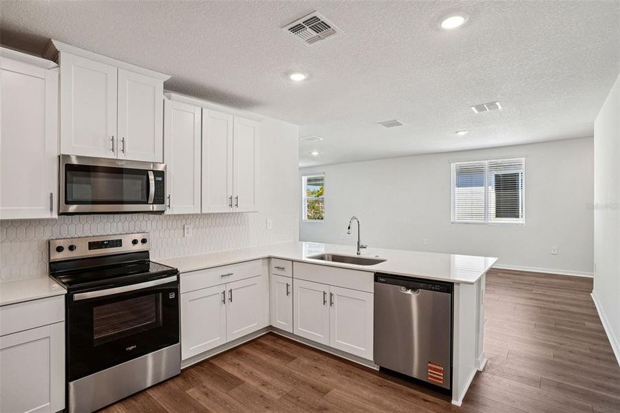 Furnished interior view inside a new home in Ridgehaven - Villas, Ormond Beach (Image 8).