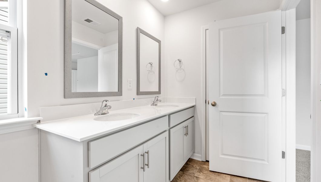 Furnished interior view inside a new home in Harper Ridge, Roebuck (Image 14).