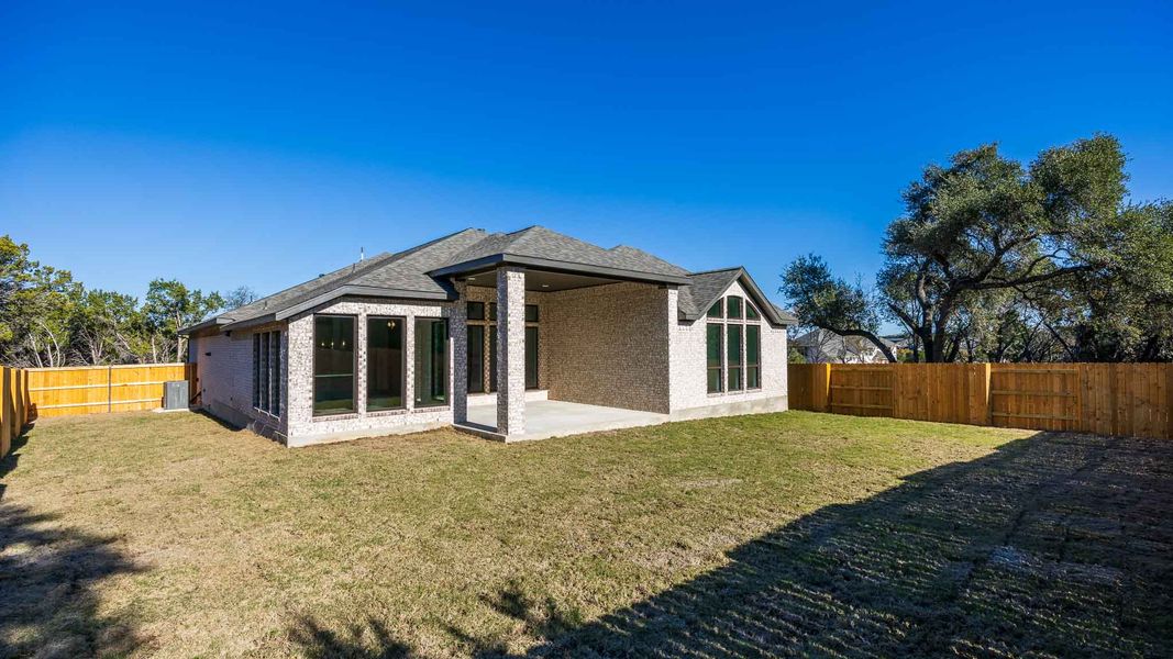Exterior details and patio area of a home in Parkside On The River 60', Georgetown (Image 3).