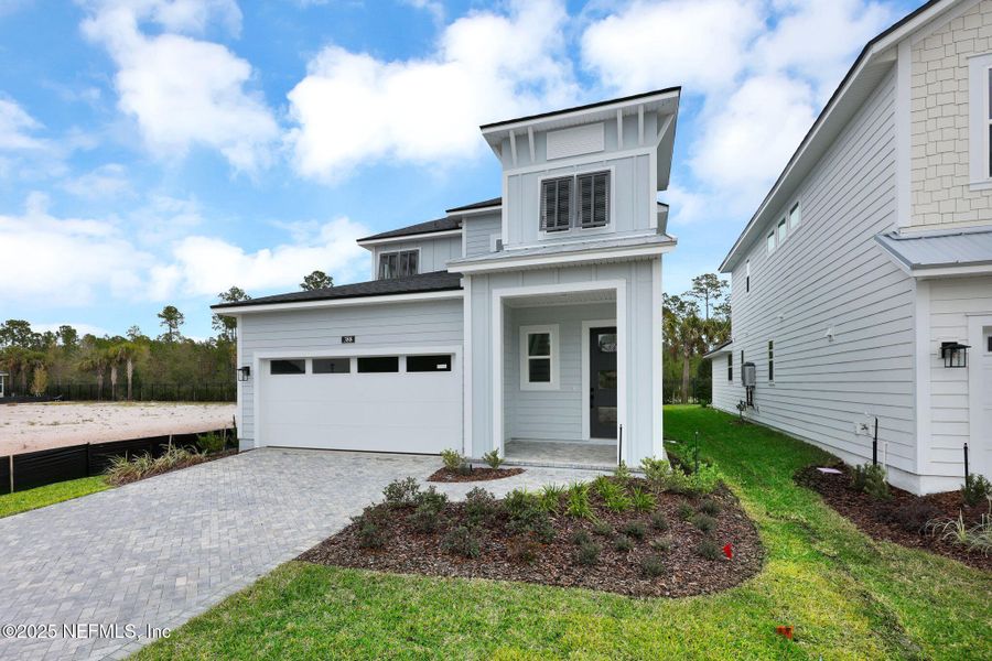 Front exterior of a new home in , Ponte Vedra, FL, highlighting curb appeal (Image 28).