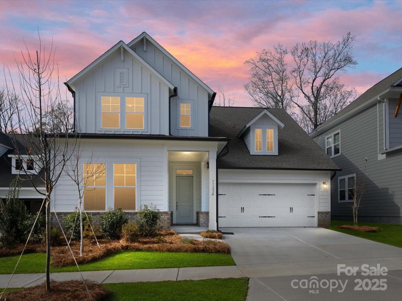 Front exterior of a new home in North Creek Village, Huntersville, NC, highlighting curb appeal (Image 23).