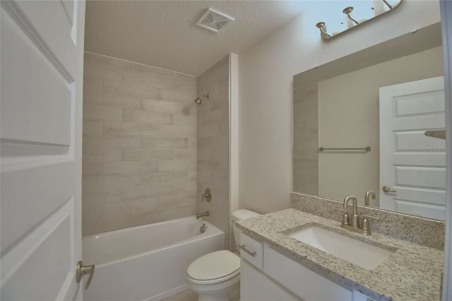 Furnished interior view inside a new home in Lake Juliana Estates, Auburndale (Image 11).