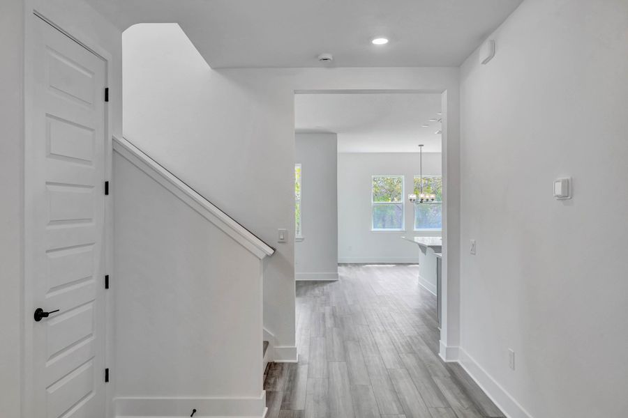 Representative unfurnished interior of a home built from the Faulkner by Rockwell Homes in Northlake At Ovation, Winter Garden (Image 20).